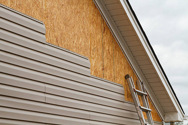Professional Siding Installation technician working in Elmont, NY
